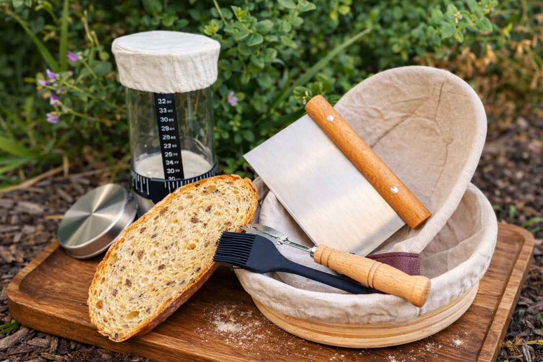 Bread, knife, and measuring cup on a wooden board with a natural background